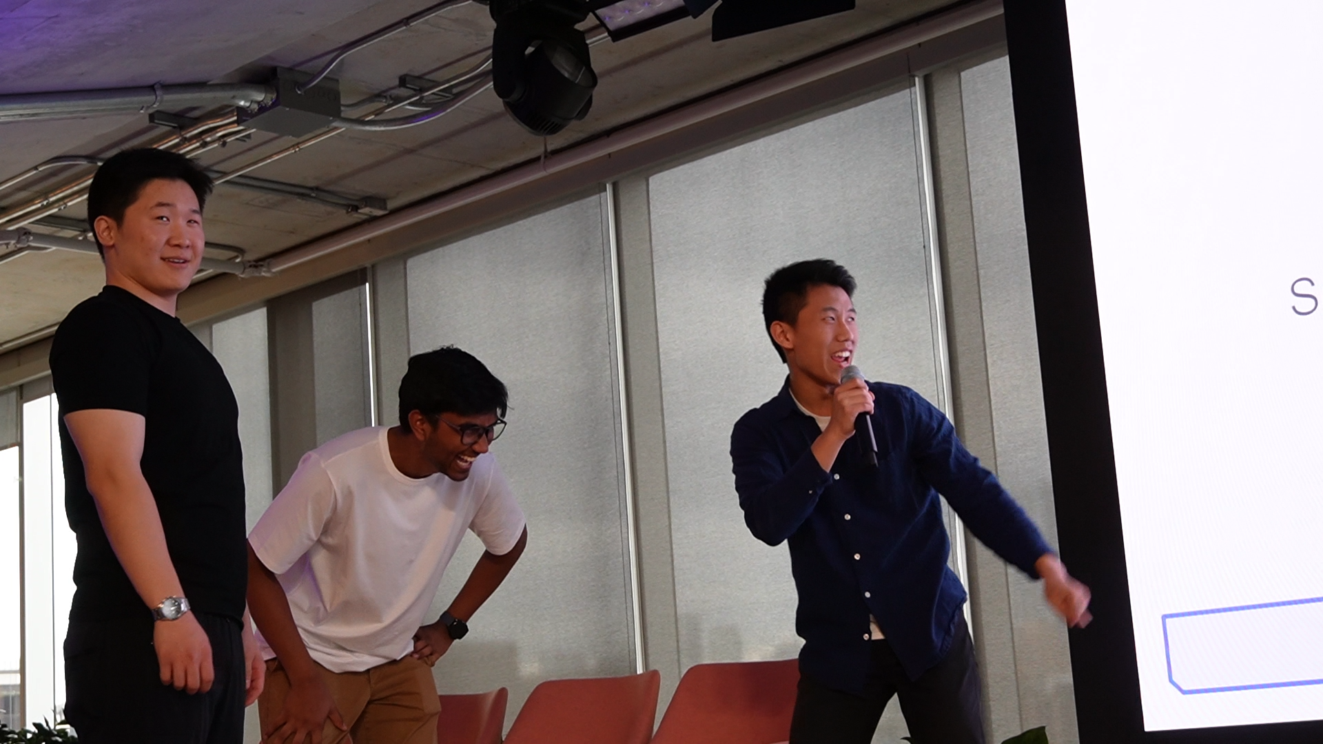 Teen presenting project with microphone